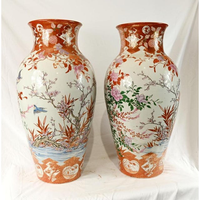 A fine and decorative pair of antique japanese satsuma porcelain floor vases, richly painted with traditional bird and...