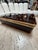 Elegant Italian rectangular box featuring a richly patterned tortoiseshell-effect Lucite lid framed in polished brass. Its...