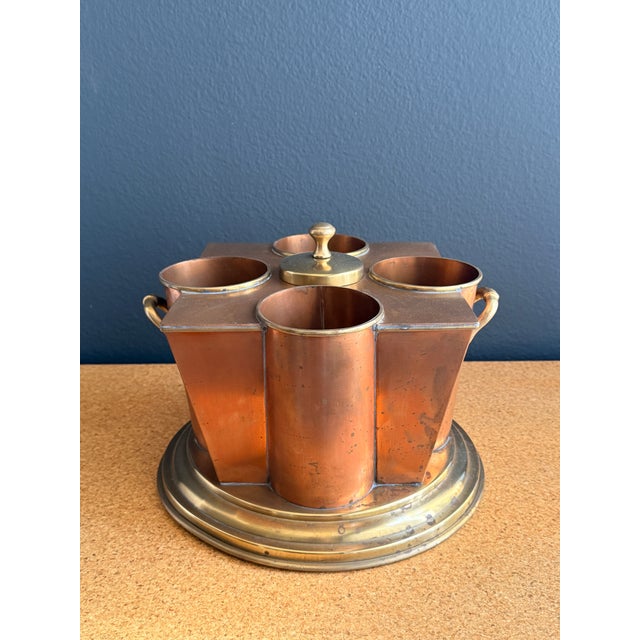 Patinated copper and brass four bottle wine cooler with ice compartment.