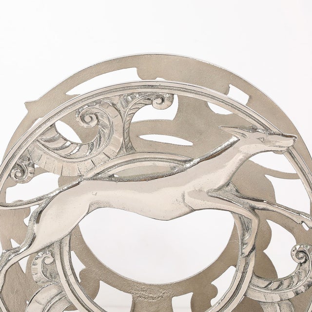 This stunning Art Deco nickeled bronze magazine stand, crafted in France circa 1935, is a remarkable example of the...