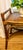 Vintage bamboo and rattan accent bench with a light gloss finish, varying in shades of golden and medium brown,...