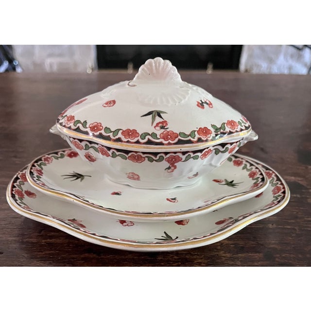 Exceptional late 19th-century English semi-porcelain miniature sauce tureen set featuring a vibrant Imari-inspired palette...
