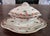 Exceptional late 19th-century English semi-porcelain miniature sauce tureen set featuring a vibrant Imari-inspired palette...