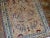 Persian Kerman Lavar rug in original condition, it has some low pile. The rug is prayer in beige and burgundy shades, made...