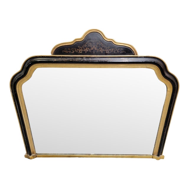 Late 19th Century Gilded and Ebonized Mirror With Floral Decoration For Sale