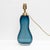 Elegant Italian table lamp in blue Murano glass, crafted using the traditional Sommerso glass technique. The body features...