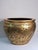 A striking vintage ceramic cachepot in the traditional Chinese fishbowl form, featuring an elegant black and gold finish...
