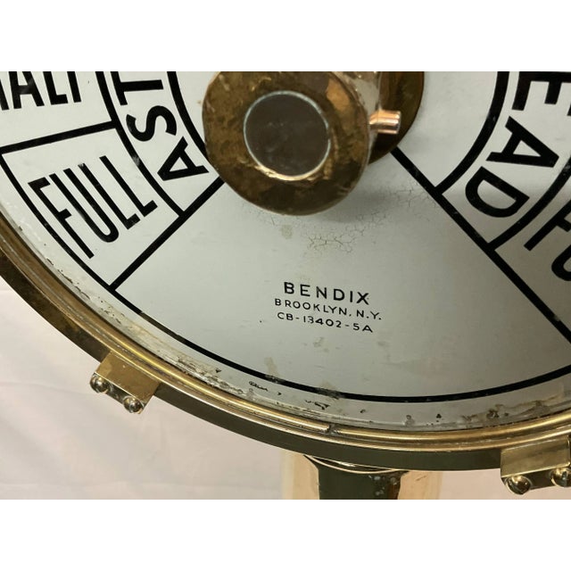 Highly polished engine order telegraph by Bendix of New York. With painted faceplates with ships commands full, half,...