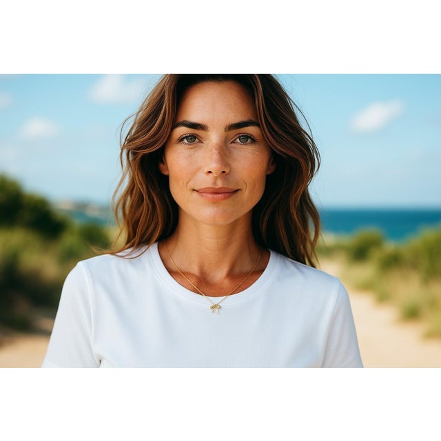 Delicate, feminine, and unmistakably iconic—this Tiffany & Co. 18K Rose Gold Bow Necklace exudes refined elegance with a...