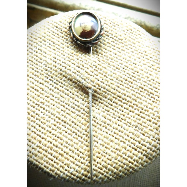 The English European Victorian Woman whose sepia-toned photograph is seen in this 1880's stickpin, will make people smile...