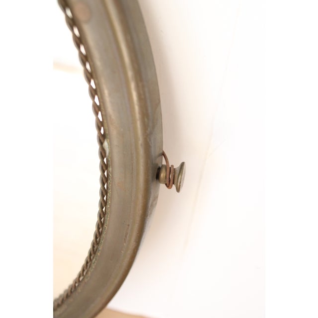 The beautifully aged brass frame captured our hearts when we spotted this lovely vintage mirror in a flea market in...