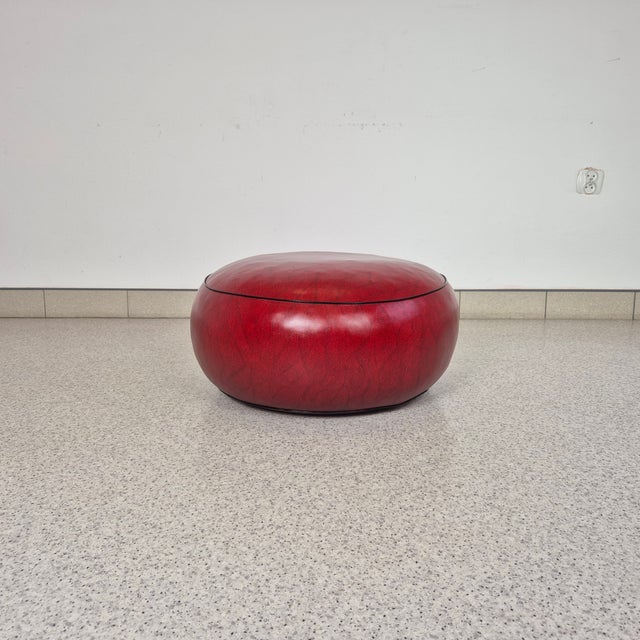 Comfortable Vinyl Pouf / Footstool, Italy, 1970s Dimensions: Height – 27 cm Diameter – 55 cm The soft, low profile and...