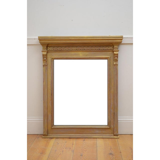K0620 elegant edwardian wall mirror, having cavetto cornice above carved frieze and oblong glass, (possibly a replacement)...