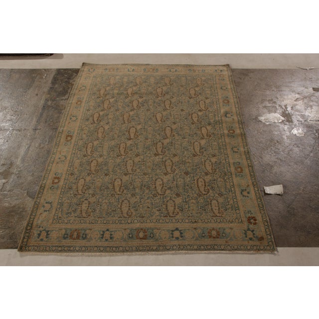 An enticing spectacle of refined wool craftsmanship originating circa 1920-1930 enjoying a blissful marriage of geometric...