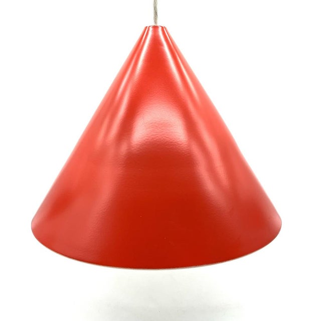 This striking cone pendant lamp is an homage to iconic Danish lighting design, made world-famous by Louis Poulsen. with...