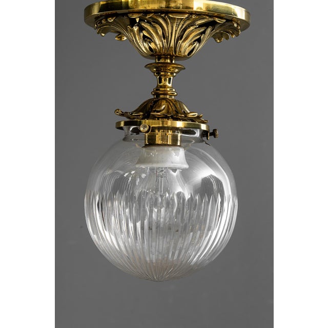 Historistic brass ceiling lamp with cut glass shade vienna around 1890s Brass polished and stove enameled Original cut...