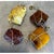 This vintage bracelet showcases four freeform amber stones, each left in a raw, organic shape with natural fractures,...