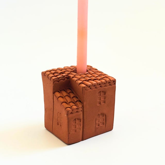 A small vintage tiny taper candle holder in the shape of house, made out of terra cotta pottery. Lovely hand made quality...