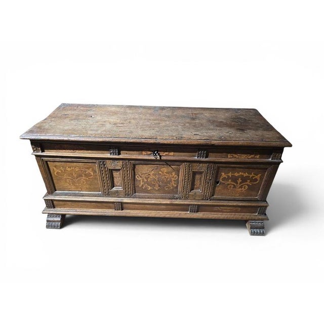 An impressive and highly decorative 19th-century Catalan wooden chest, distinguished by its elaborate marquetry decoration...