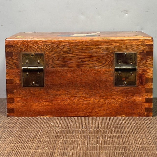 A beautiful vintage Chinese hardwood keepsake box, crafted from warm, amber-toned Huali (Rosewood) with striking natural...