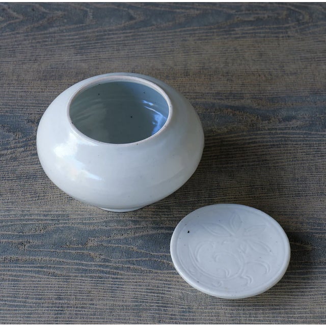 from roman and william guild gallery by tomoko sakai The white porcelain pieces are Tomoko's signature works. The...