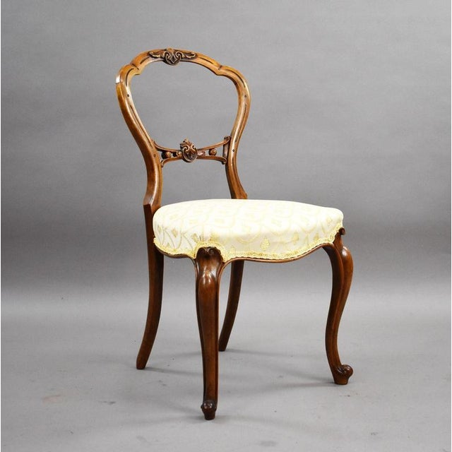 Set of 4 Victorian Walnut Balloon Back Dining Chairs Item Code: LC1462 A decorative set of four Victorian walnut dining...