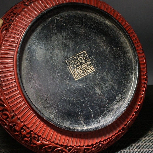 Make a bold and majestic statement with this spectacular Vintage Cinnabar Carved Lacquer Dragon Plate. Masterfully carved...