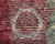 A field split between fire and sea, softened at the seam. This hand-knotted wool rug commands attention with a bold two-...