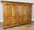 A striking Vintage French wardrobe crafted from oak, featuring an impressive five door design with beautifully shaped...