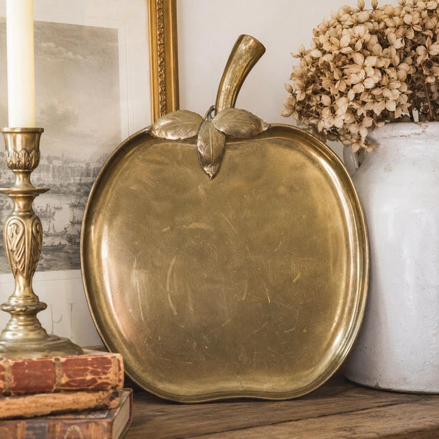 Large vintage Sarreid Ltd. brass apple tray No. 2319, made in Spain, with applied leaves, aged patina and a rear loop for...