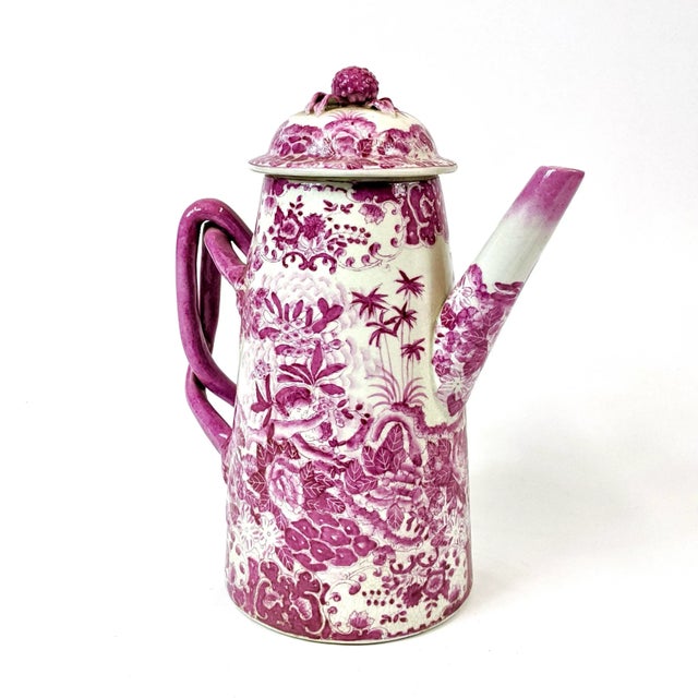 This porcelain pitcher is intricately hand-painted with details florals. No decals or transfers were used for the design
