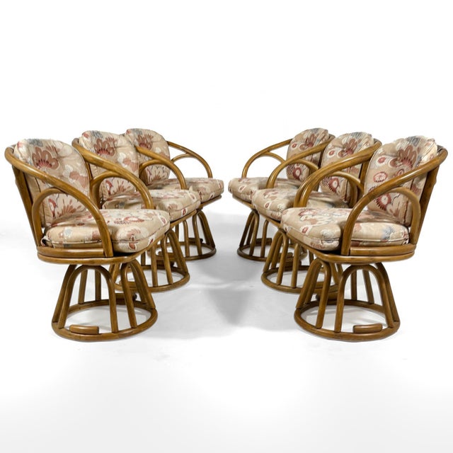 These lovely sculptural rattan chairs by Brown Jordan have a terrific scale, are very comfortable, and very well made....