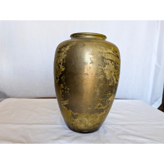 Antique bronze vase with birds and flowers. It has fading due to its age but it is still a very cool and unique piece.