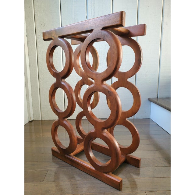 Beautifully made mid century wood wine holder is perfect for small spaces. Each opening is 3.5 inches in diameter and can...