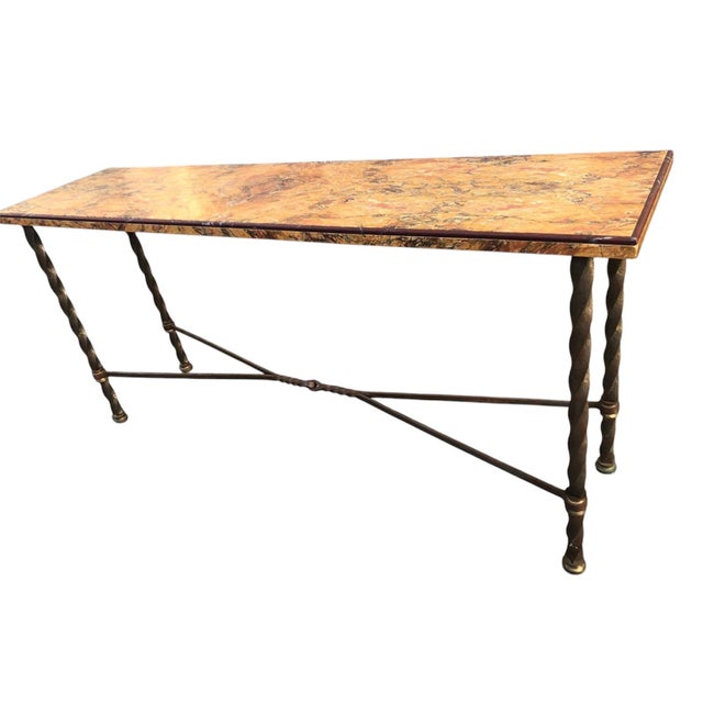 This 1950S Italian console table features a richly veined marble top and a hand-forged iron base with twisted legs,...