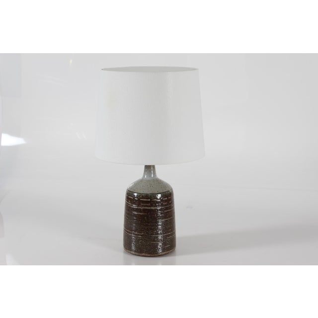 Large mid-century conical shaped table lamp made by danish palshus ceramic. the lamp was designed by per lindemann-schmidt...