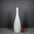 ABOUT Tall glass bottle with Teak stopper from the 1957 Opaline series. CREATOR Designed by Jacob E Bang (1899 - 1965) and...