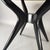 Round table with an elegant Italian design from the 1950s. Black lacquered wood frame, olive green glass top. Excellent...