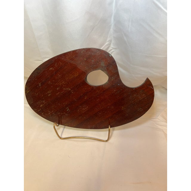 Great decorative piece to use in a bookshelf. Great conversation piece. Purchased in the home of an art collector. The...