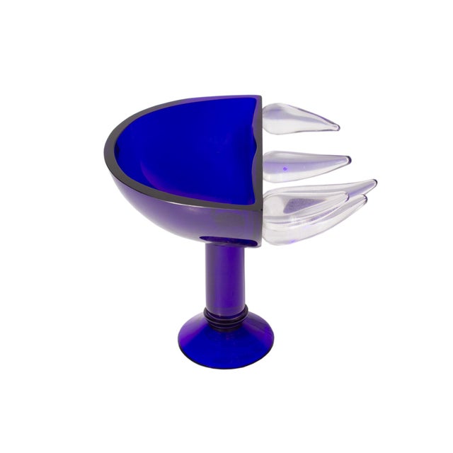 A limited edition blue glass compote designed by the Czech glass artist and designer David Sobotka for Alchymie Praha....