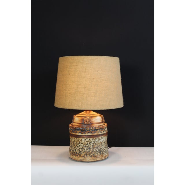 Roland Zobel influence ceramic lamp .Fired earth tones of saffron yellow and deep chestnut brown .Finished with a hand...