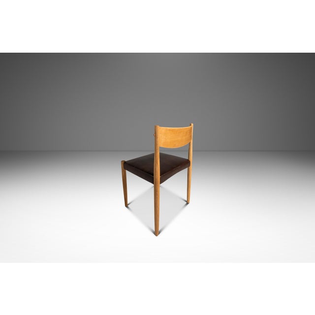This clean and elegant Mid-Century Danish Modern side / dining chair by Poul Volther for Frem Røjle exemplifies the...