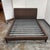 Design Plus Gallery presents a Queen Size Hoffman Bed from Room & Board. Upholstered in a dark chocolate woven fabric, the...