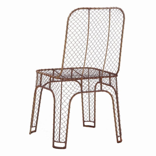 The design of these metal-framed side chairs with an Eiffel-style base is a nod to industrial architecture, combining...