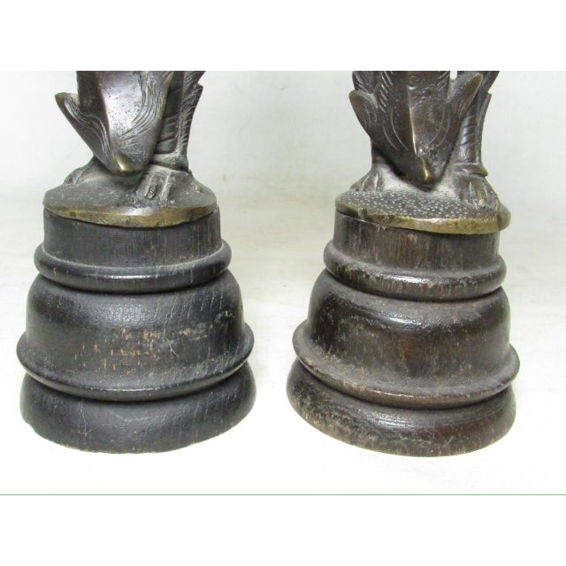 Pair of antique Thai bronze statues of Kinaree (female) and Kinnon (male). They are half human and half bird like mythical...