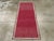 A vintage Turkish Anatolian throw rug. A string-like ivory border makes a simple frame for the well-abrashed totally plain...