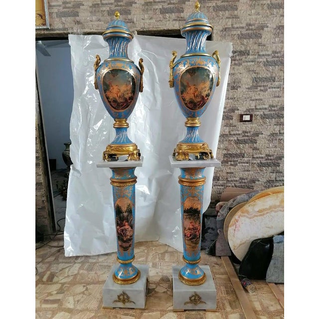 Make a striking statement with this grand decorative vase and pedestal, featuring an elegant combination of celestial...