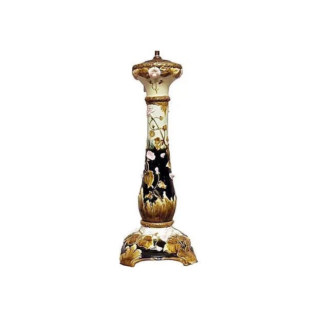 Where do you find a fabulous majolica table lamp like this one with floral motif in vibrant tones. Wired and working....