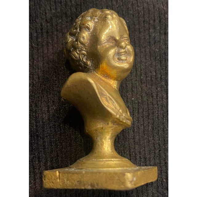 bronze 19th century from France The child is draped and reveals his chest and shoulders. Her smiling face offers a nice...
