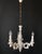 The chandelier is made of porcelain. It is adorned with beautiful mouldings and hand-painted details. A luxurious and...